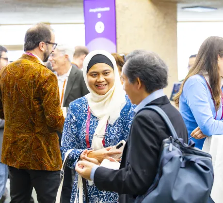 Participants interact in Global Village of the World Cancer Congress 2024