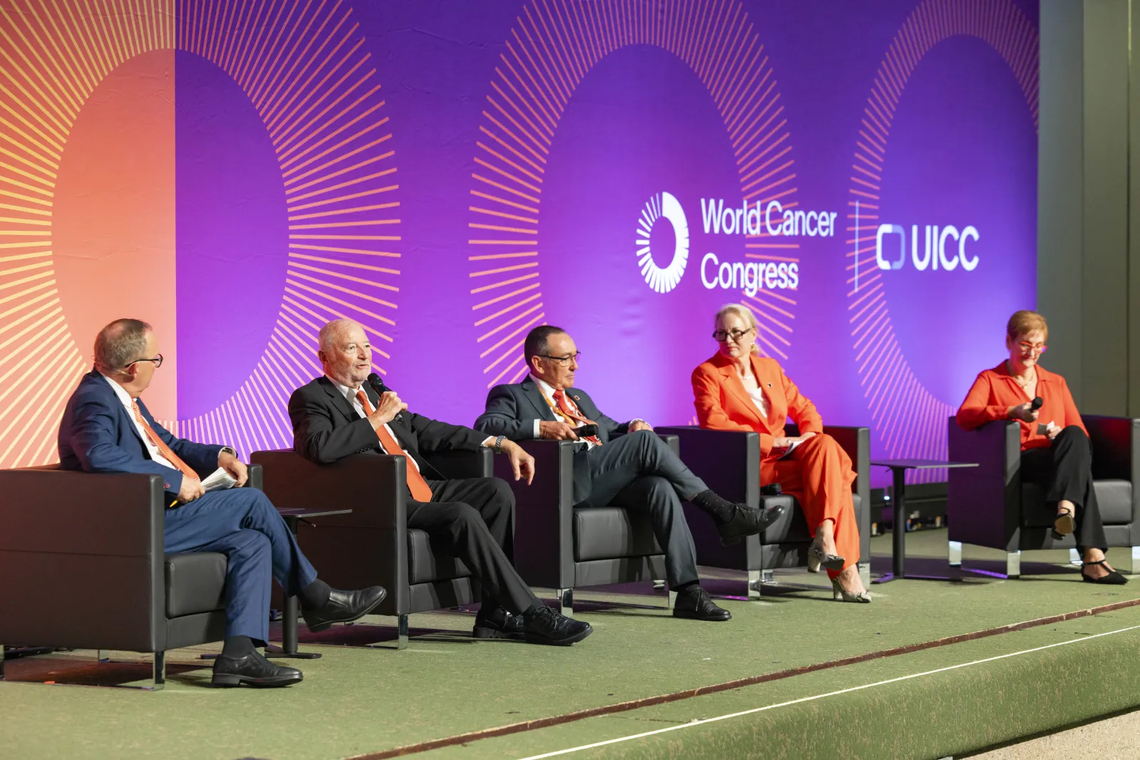 Speakers on stage for a plenary session at the WCC2024