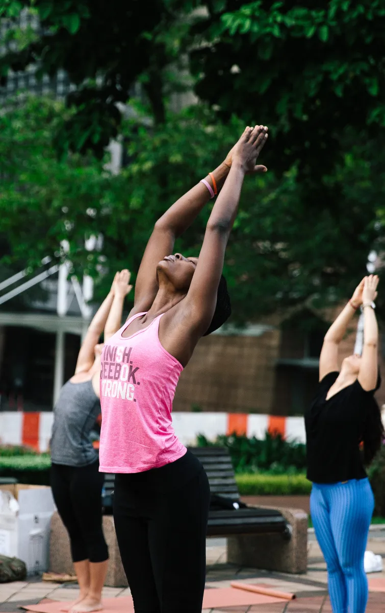 People doing yoga during the 2018 World Cancer Congress